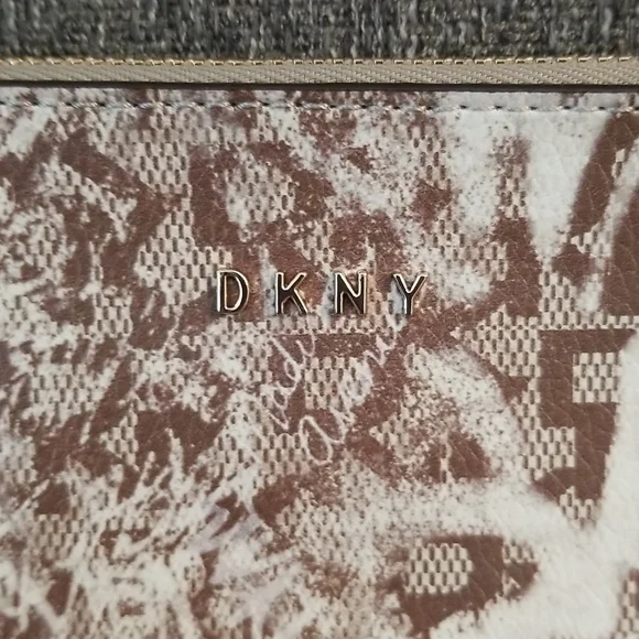 Brand new DKNY medium wristlet. Brown Graffiti pattern. Retails $78 - Picture 7 of 9